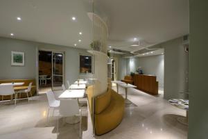 Posezení v ubytování Aromi Piccolo Hotel