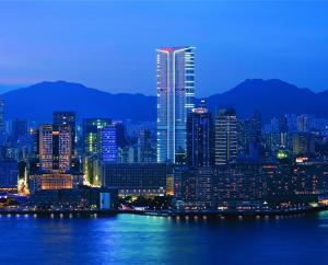 a view of a city at night with at Hyatt Regency Hong Kong Tsim Sha Tsui in Hong Kong