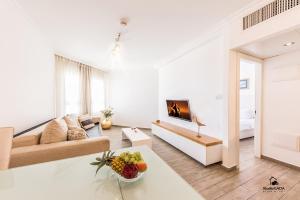 Μια τηλεόραση ή/και κέντρο ψυχαγωγίας στο Kings Towers Apartments