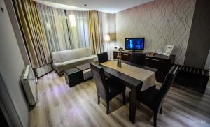 โทรทัศน์และ/หรือระบบความบันเทิงของ Garni Hotel 018 In