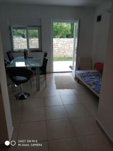 Posteľ alebo postele v izbe v ubytovaní Apartments Nogic