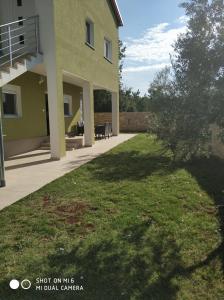 Vonkajšia záhrada v ubytovaní Apartments Nogic