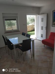 Posedenie v ubytovaní Apartments Nogic