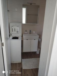 Kuchyňa alebo kuchynka v ubytovaní Apartments Nogic