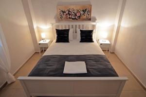 Postel nebo postele na pokoji v ubytování Camping Orpheus Apartments