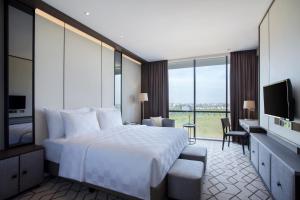 TV a/nebo společenská místnost v ubytování Wyndham Opi Hotel Palembang