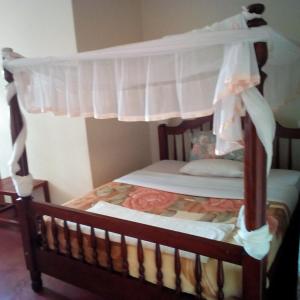 Letto o letti in una camera di Skyway Hotel