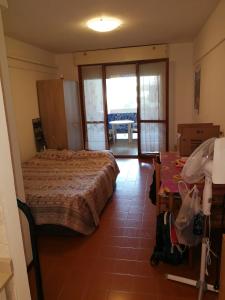 Ένα ή περισσότερα κρεβάτια σε δωμάτιο στο Residence Solarium