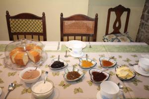 a table with dishes of food on it at La Llosa in Villaviciosa