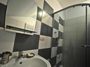 Ванная комната в Hotel Arkadia