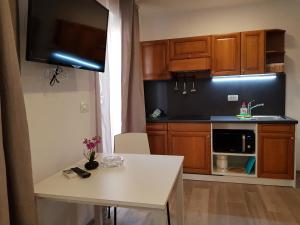 Kuchyň nebo kuchyňský kout v ubytování Beachfront Studio Palma
