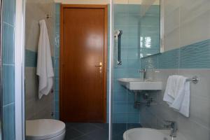 Koupelna v ubytování Albergo Marla