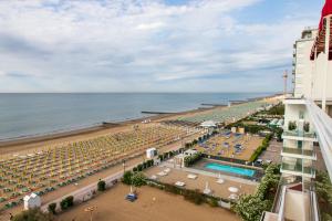 a view of a beach and a hotel and the ocean at Residence Panama in Lido di Jesolo