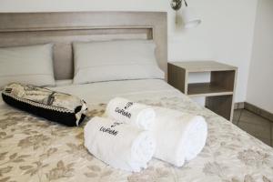 Posteľ alebo postele v izbe v ubytovaní B&B al Doremi