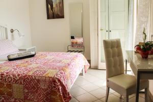 Posteľ alebo postele v izbe v ubytovaní B&B al Doremi