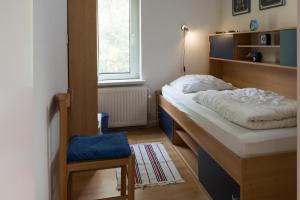 Tempat tidur dalam kamar di Joossesweg 86