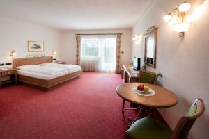 Postel nebo postele na pokoji v ubytování Hotel Greifenstein