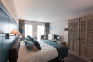 Postel nebo postele na pokoji v ubytování B&B Riche Terre