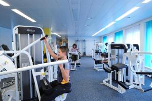 The fitness centre and/or fitness facilities at Herisau Swiss Quality Hotel