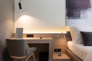 Postel nebo postele na pokoji v ubytování Garden Suites Park Plava Laguna