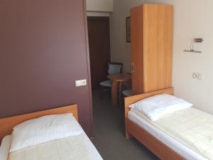 Posteľ alebo postele v izbe v ubytovaní Pokoje Gościnne