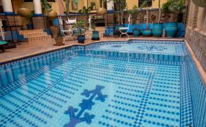 Bazén v ubytování Amani Hotel Suites & Spa nebo v jeho okolí