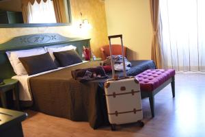 Voodi või voodid majutusasutuse Hotel Federico II toas