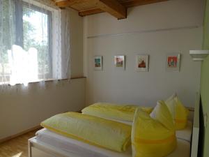 Postel nebo postele na pokoji v ubytování Alte Scheune Rietzschelhof + 37 fotografií