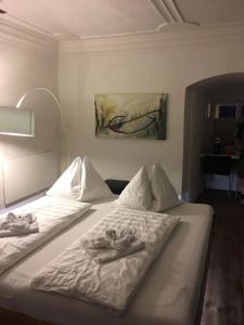 Posteľ alebo postele v izbe v ubytovaní Turmhotel