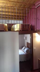 two bunk beds in a room with a bed at Casa Lola in Villastose