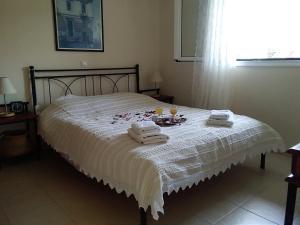 A bed or beds in a room at Casa memories