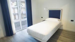 Posteľ alebo postele v izbe v ubytovaní Piamarta Apartments + 17 fotografií