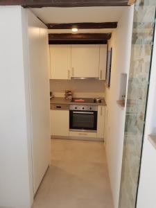 A kitchen or kitchenette at The Istrian