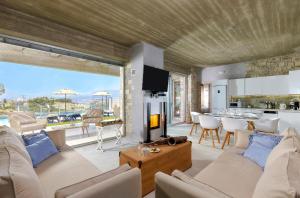 Posezení v ubytování Kouros n' Kori Villas