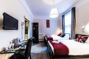 TV a/nebo společenská místnost v ubytování Saba Hotel London