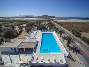 an overhead view of a swimming pool at a resort at Hostel Naxos Camping in Naxos Chora