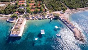 an aerial view of a beach with boats in the water at Holiday Park Mandrice in Mandre