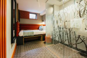 Voodi või voodid majutusasutuse Iveagh Garden Hotel toas