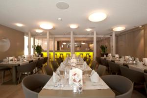 A restaurant or other place to eat at Herisau Swiss Quality Hotel