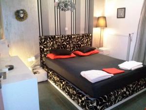 A bed or beds in a room at Greek hospitality 2