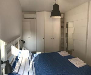 Postel nebo postele na pokoji v ubytování A Casa di Leo