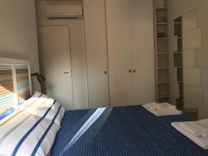 Postel nebo postele na pokoji v ubytování A Casa di Leo