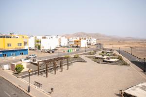 a view of a city with buildings and a street at Casa Checa Apartment 2 in Cotillo