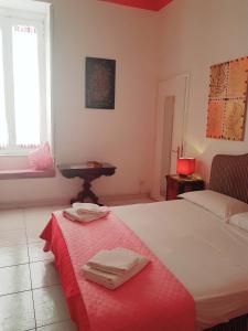 Postel nebo postele na pokoji v ubytování B&B Platamon