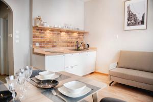Kuchyňa alebo kuchynka v ubytovaní Apartament Kopernika 25