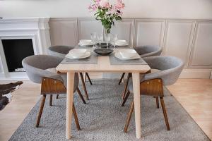 Posedenie v ubytovaní Apartament Kopernika 25