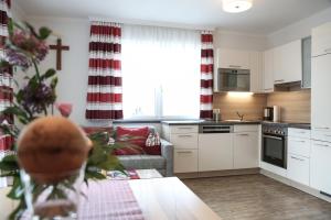 Kuchyň nebo kuchyňský kout v ubytování Appartments am Esslgut