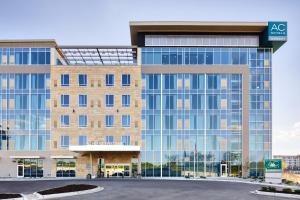 an office building with a lot of windows at AC Hotel by Marriott Minneapolis West End in Minneapolis