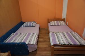 Cama ou camas em um quarto em Apartments Bozic