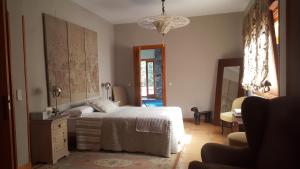 Posteľ alebo postele v izbe v ubytovaní Casa Bonita Navacerrada